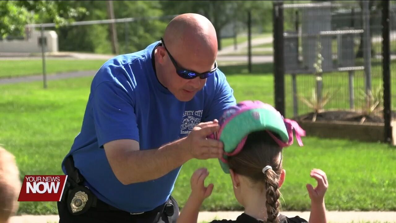 Kids learning safety tips thanks to Lima Noon Optimists